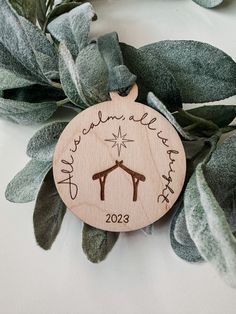 a wooden ornament that says, you can't let the light shine on christmas