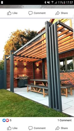 an image of a backyard with a bbq and picnic table