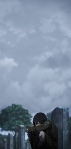 a man sitting on top of a bench next to a tall building under a cloudy sky