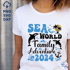 a woman wearing a t - shirt that says sea world family adventure