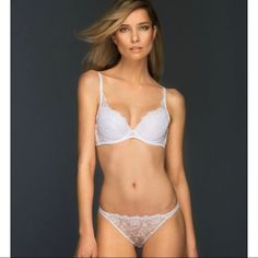 Beautiful Lacy Plunge Style Bra Has Removable Push Up Pads, Hook And Eye Closure At Back, And Adjustable Straps. Also Features A Beautiful Little Bow At Centerfront With Decorative Bead. Color Is A True, Crisp White, Not Off White. Size Runs True To Size Bra Is Both Super Comfortable And Super Sexy!! Makes A Great, Supportive Everyday Bra Or Special Occasion Piece. Also Great For Bridal Lingerie. Push Up Pads, Everyday Bra, Bridal Lingerie, Push Up Bra, Bra Sizes, White Lace, Women's Intimates, Push Up, Adjustable Straps