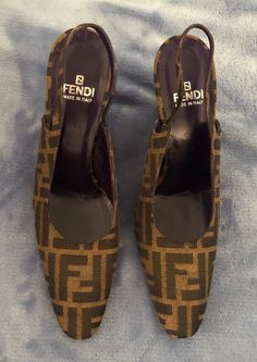 Classic Vintage FENDI Logo Sling back shoes ...  size 9 M  (Equivalent to size US 8 1/2) in great condition!   These shoes are so beautiful and look wonderful on.  They compliment any outfit and you will light up a room with them on :) Made in Italy Designer Brown Slip-on Heels, Designer Brown Slingback Pumps With Pointed Toe, Fendi Heels, Sling Back Shoes, 90s Logos, Back Shoes, Fendi Vintage, Vintage Fendi, Fendi Logo