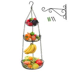 PRICES MAY VARY. Heavy Duty Wire Kitchen Basket: Vertical installation, better control of the height of the metal fruits basket. Round metal piece added to the bottom of the hanging basket to effectively prevent small fruits from falling. Elegant and minimalist design that is both functional and decorative. Three tiered hanging fruit basket can change the overall look of kitchen, especially small ones where storage and counter space is limited. Removable Banana Hook: With a banana hook, it is a Fruit Organization, Hanging Vegetable Basket, Black Wire Basket, Hanging Fruit Basket, Produce Baskets, Wire Fruit Basket, Produce Storage, Hanging Fruit Baskets, Baskets Storage