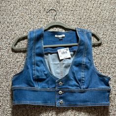 American Eagle Denim Crop Vest Size L New With Tags Cropped Blue Denim Vest With Pockets, Cropped Denim Top With Button Closure, Medium Wash Denim Vest For Day Out, Day Out Medium Wash Denim Vest With Button Closure, Casual Cropped Denim Blue Vest, Trendy Cropped Blue Denim Vest, Blue Denim Vest With Button Closure For Day Out, Spring Dark Wash Denim Top, Cropped Denim Top For Day Out