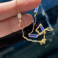 14K Yellow Gold Lapis Lazuli Station Necklace. This luxurious necklace is designed to last with the high-quality materials used. The polished Italian 14K Yellow Gold settings showcase the beautiful Lapis Lazuli Inlayed to create an elegant look. Complete with a lobster clasp for secure closure. Thank you for visiting our shop! 𝑫𝑴𝑲 𝑱𝒆𝒘𝒆𝒍𝒓𝒚 Luxury Sapphire Necklace Hallmarked, Elegant Lapis Lazuli Jewelry With Adjustable Chain, Luxury Necklace With Rectangular Pendant And Adjustable Chain, Luxury Necklace With Adjustable Chain And Rectangular Pendant, Exquisite Blue Jewelry With Polished Finish, Elegant Blue Jewelry With Cable Chain, Elegant Blue Cable Chain Jewelry, Luxury Blue Hallmarked Necklace, Luxury Necklace With Rectangular Pendant And Cable Chain