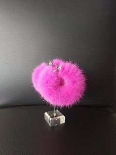 Stud hoop earrings with hot pink  mink fur. Quality brass earrings. The earring has its own closure (Latch back). Diameter of the circle is 1.89 inch =4.8 cm. Total length with fur is approximately 6.5 cm.  Each earring weights 5-6gr. Available in all colors of fur and for wholesale as well. Just inbox us what do you need. You can see the style of earring here:  https://www.etsy.com/listing/722300624/hoop-earrings-large-hoops-45mm-in?ref=shop_home_active_1&frs=1 We ship with registered mail via Hot Pink Jewelry, Fur Keychain, Rave Girl, Pink Fur, Brass Hoops, Large Hoop Earrings, Pink Earrings, Mink Fur, Brass Earrings