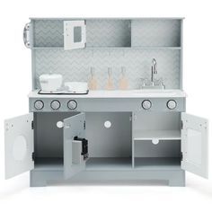 a kitchen with an oven, sink and cabinets in grey color on the white background