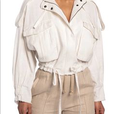 This White Linen Jacket Is Suitable For Summer. It’s Really Stylish And Was Never Worn. The Original Tag Is Still Intact. Thank You For Visiting My Closet, All Purchases Are Final. Chic Cropped White Outerwear, Chic White Cropped Outerwear, White Spring Utility Jacket For Work, White Spring Utility Jacket For Workwear, White Collared Utility Jacket With Pockets, White Long Sleeve Utility Jacket For Spring, White Collared Utility Jacket For Fall, White Cropped Outerwear For Spring, Trendy White Utility Jacket For Fall