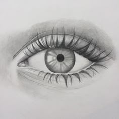 a drawing of an eye with long lashes