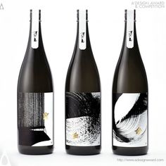 three bottles of wine sitting next to each other