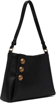 Grained calfskin shoulder bag in black. · Adjustable crossbody strap · Logo hardware at face · Magnetic press-stud closure · Zip pocket at interior · Unlined · Logo-engraved gold-tone hardware · H7.5 x W10 x D2.75 Supplier color: Noir Black Shoulder Bag With Gold-tone Logo For Office, Leather Shoulder Bag With Gold-tone Logo For Everyday Use, Gold Calf Leather Shoulder Bag With Brass Hardware, Leather Shoulder Bag With Gold-tone Logo For Business, Business Leather Shoulder Bag With Gold-tone Logo, Gold Calf Leather Bags With Turn-lock Closure, Leather Shoulder Bag With Gold-tone Logo Plaque, Leather Satchel Shoulder Bag With Gold-tone Logo, Gold Satchel Shoulder Bag With Gold-tone Logo Plaque