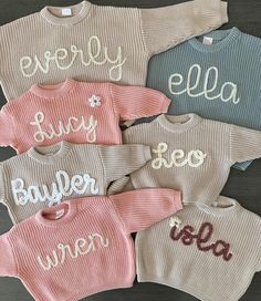 My current turnaround time for these hand embroidered sweaters is approximately 2 weeks.  These super cute hand embroidered name sweaters are perfect for your little ones! Sizes 0-6m to 4T. Sweaters are OVERSIZED and have a chunky fit. Refer to measurements below. Second photo of the name Sophie is with chunky dusty pink yarn for the letters. The flower is chunky natural with mustard center. If you would like a flower, order includes one flower free or charge for names without "i's." please include that you would like one. It will be located on the top left of sweater. 100% COTTON  For these sweaters below, 18-24m is the same as 2T. White Mocha Pink Dusty Blue Rose Pink Cream/Beige Lilac Measurements 0-3 months: length-11in./bust-12in./ sleeve-6in. 3-6 months: length-11.5in./bust-13in./sle Cute Embroidered Winter Tops, Cute Winter Tops With Embroidered Text, Cute White Embroidered Sweater, Personalized Pink Long Sleeve Sweater, Personalized Cute Crew Neck Sweater, Cute White Sweater With Embroidered Text, Personalized Pink Sweater For Winter, Cute Cotton Sweater With Floral Embroidery, White Cute Sweater With Embroidered Text