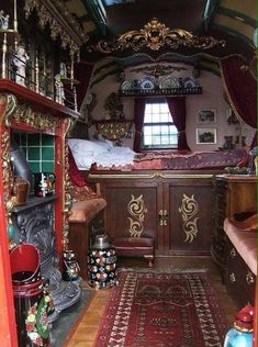 an old fashioned bedroom with antique furniture and decor