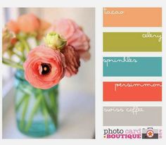 a vase filled with pink flowers on top of a table