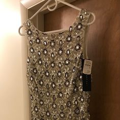 This Amazing Dress Is Covered With Crystals And Sequins In Natural And Black. Purchased From Neman Marcus But Never Chance To Wear It. It Is Knee Length Size 6 With A Tulle Hem. 2 Darts A Line For Form Fit But Not Overly Tight. Has A V Back And Closes With An Invisible Zipper. Fully Lined. Retail 585.00. Comes With Extra Sequins And Crystals. Any Questions Please Ask. This Is A True Size 6. Perfect For Weddings, Prom Or Just A Night Out. Sparklemuffin Tour, Silk Yellow Dress, Flowy Sundress, Two Piece Gown, Glam Photoshoot, Stripped Dress, Hi Low Dresses, Wrap Midi Dress, Black Sequin Dress