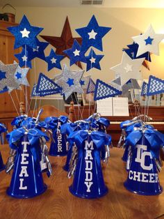 blue and silver party decorations on a table