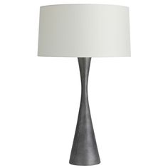 a table lamp with a white shade on it