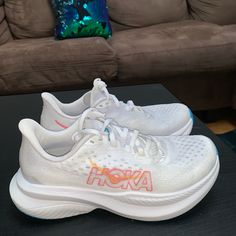 Worn For About A Week, In Very Good Condition. Please Give A Reasonable Offer. Thanks! White Low-top Running Shoes With Ortholite Insole, White Slip-on Running Shoes With Ortholite Insole, White Lace-up Running Shoes With Translucent Outsole, White Slip-on Running Shoes With Boost Midsole, White Slip-on Running Shoes With Translucent Outsole, Hoka Shoes, Athletic Shoes, Blue White, Color Blue