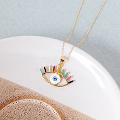 "14K Solid Gold Horus Eye Necklace, Multi Color Spiritual Protection Jewelry, Egyptian Eye Pendant, Wadjet Eye Necklace, Ra Eye, Gift For Her ► Adding a customized tiny bar at clasp may be a good idea: https://etsy.me/3cn9OQ5 Material: Solid Gold Karat: 14 K (585) You can customize your chain length and thickness. Chain Length - 16 inches adjustable 15 inches (choker) Chain Length - 18 inches adjustable 16 inches Chain Length - 20 inches adjustable 18 inches Chain Length - 22 inches adjustable 2 Handmade Multicolor Gold Plated Necklace, Handmade Multicolor Gold-plated Necklace, Multicolor Gold Plated Pendant Necklace, Eye-catching Gold Jewelry For Gift, Horus Eye, Egyptian Eye, Protection Jewelry, Eye Gift, Choker Chain