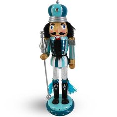 a nutcracker figurine on a white background