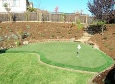 This could be your yard.  All it takes is a visit to our superstore.  We'll set you up with everything you'd need and with  a little of our guidance and installation tips you can take your short game to another level! Golf Green, Golf Tips For Beginners, Paint Colors For Living Room, Mini Golf, Golf Tips, Garden Stones