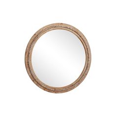 a round mirror on a white wall with a wooden frame and beading around the edges