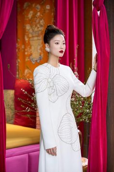 Lumins Sheath Round Neck Velvet Satin Floor Length Ao Dai | MEAN BLVD Fitted Long Sleeve Evening Dress For Ceremony, Luxury Long Sleeve White Dress, Luxury White Long Sleeve Dress, Fitted White Ao Dai For Ceremonies, Elegant Long Sleeve Dress For Ceremony, Elegant White Ao Dai For Formal Occasions, Elegant Festive Evening Dress For Ceremonies, Elegant Evening Dress For Festive Ceremonies, Elegant Formal Fitted Ao Dai