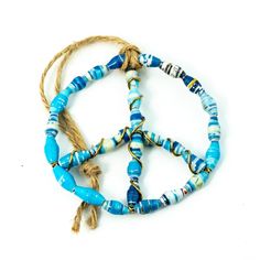 three pieces of blue and white beaded bracelets with rope attached to each other