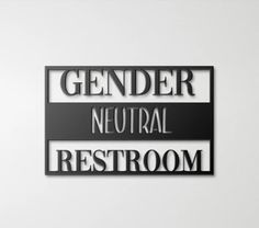 two metal signs that say gender and neutral restroom