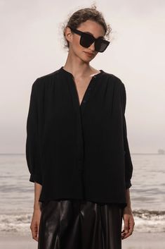 Marish Top - Black | Heidi Merrick Relaxed Fit Rayon Blouse For Vacation, Vacation Rayon Blouse With Relaxed Fit, Effortless Long Sleeve Beach Blouse, Effortless Long Sleeve Blouse For Beach, Breezy Relaxed Fit Tops For Daywear, Chic Relaxed Fit Blouse For Vacation, Breezy Tops With Relaxed Fit For Daywear, Versatile Relaxed Fit Blouse For The Beach, Chic Vacation Blouse Made Of Rayon