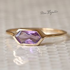 Classic Octagon Amethyst Ring As A Gift, Classic Octagon Amethyst Ring For Gift, Classic Octagon Amethyst Ring As Gift, Faceted Amethyst Ring In Yellow Gold Fine Jewelry, Amethyst Octagon Ring For Gift, Yellow Gold Octagon Faceted Rings, Fine Jewelry Octagon Birthstone Ring, Yellow Gold Amethyst Ring With Bezel Setting Gift, Gift Yellow Gold Amethyst Ring With Bezel Setting