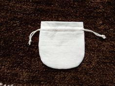 Fancy and stylish round white cotton pouch, custom logo pouch, INDIAN stylish POTLI bags , jewelry gift bags you can use this type of pouches in any occasion like marriage party, ring ceremony, birthday party, and also you can use for giving the gift. size :- 4 x 4 inches (10 x 10 cm) -------------- CUSTOM SIZE ARE ALSO AVAILABLE fabric:- 100% white cotton fabric (20 x 20 sitting) drawstring :- white cotton string you can try with tassel from this link... https://www.etsy.com/in-en/listing/64804 Ring Ceremony, Rings Ceremony, Marriage Party, Cotton Pouch, Potli Bags, Cotton String, Party Bags, Cute Bags, Jewelry Pouch