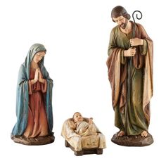 three statues of mary and jesus with a baby jesus in a manger, on a white background