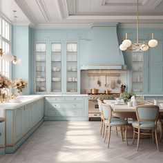 a large kitchen with blue cabinets and white counter tops, along with gold trimmings