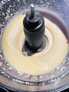 a food processor filled with batter in it