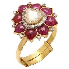 This exquisite ring is handcrafted in 18-karat gold. It is set in .80 carats ruby and .52 carats of sparkling diamonds. FOLLOW MEGHNA JEWELS storefront to view the latest collection & exclusive pieces. Meghna Jewels is proudly rated as a Top Seller on 1stDibs with 5-star customer reviews. All items manufactured by us are handmade and can be customized or redesigned. Certificate available upon request. Composition Gross Weight: 3.86 Grams Gold Net Weight: 3.57 Grams Ruby .80 carats Diamond Weight Exquisite Ruby Ring With Rose Cut Diamonds, Luxury Red Diamond Ring With Single Cut Diamonds, Luxury Pink Sapphire Rings With Single Cut Diamonds, Exquisite Ruby Ring With Diamond In Round Cut, Exquisite Ruby Ring With Diamond Round Cut, Exquisite Ruby Ring With Brilliant Cut Diamond, Exquisite Brilliant-cut Ruby And Diamond Ring, Red Diamond Ring With Single Cut Diamonds, Heirloom Ruby Ring With Single Cut Diamonds