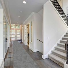 the hallway is clean and ready for us to use as an entrance way in this home