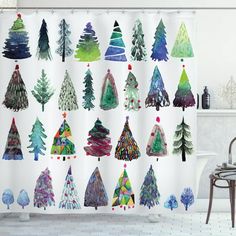 a shower curtain with christmas trees painted on it