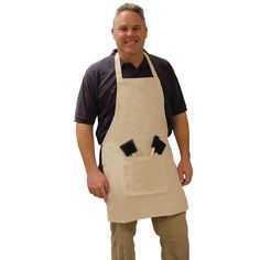 a man wearing an apron with two black square patches on the front and one white pocket