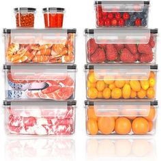 four plastic containers filled with different types of fruits and veggies in each container