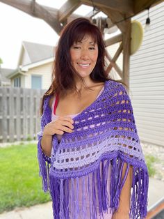 Vibrant purple Ombre Shawl Wrap yourself in elegance with this stunning large shawl, featuring a beautiful purple ombre design and delicate fringe trim. Perfect for any occasion, this versatile shawl can be worn at outdoor concerts, to keep your shoulders warm in chilly rooms, as a cozy lap blanket, or to add a pop of color to your outfit. Ideal for stylish women who love to make a statement all year round. Gift Idea: This shawl makes a thoughtful gift for anyone who adores purple and appreciate Purple Festival Scarves, Purple Bohemian Scarf, One Size, Bohemian Purple Scarf One Size, Purple Bohemian Scarf One Size, One Size Bohemian Purple Scarf, One Size Purple Bohemian Scarf, One Size Bohemian Purple Poncho, Purple Festival Shawl, Boho Shawl