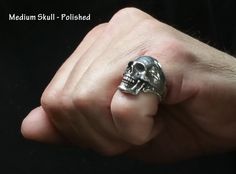 "This is a medium size version of my larger skull rings - about 3/4 size Custom made to order. A beautiful Super High Quality Heirloom piece - Hand carved from a single block of wax then cast in solid sterling silver (.925) using the lost wax process. A very unique skull - totally polished finish - inside and out. Also available with an \"OLD BONE\" vintage finish on the outside and super fine mirror polish on the inside - see other pictures.. Dimensions are: 1 inch tall and .7 inches wide. Weig Skull Ring With Polished Finish As Gift, Gift Skull Ring With Polished Finish, Skull Rings, Silver Skull Ring, Skull Ring, Lost Wax, Ring Silver, Medium Size, Silver 925