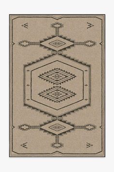 a beige rug with an intricate design on it