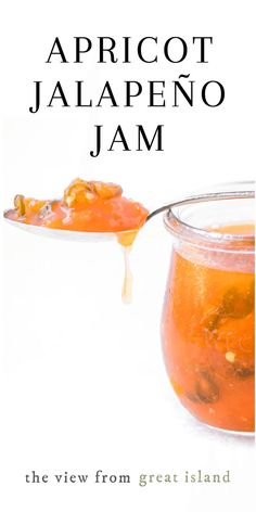 apricot jalapeno jam in a jar with a spoon full of jam