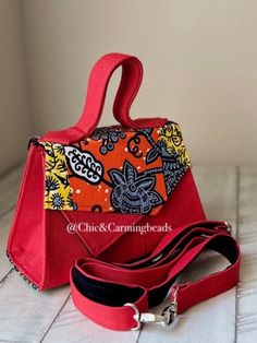 Handmade with 100% colorful Ankara print. Has an inner zipper pocket. Come with a detachable strap. Handmade Orange Bags With Double Handle, Ankara Bags Pattern, Ankara Handbags Kitenge, Red Top Handle Bag With Crocodile Pattern, Ankara Tote Bag, Ankara Bags, Ankara Print, Red Handbag, Clutch Handbag