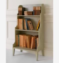 a book shelf with several books on it