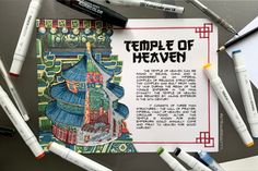 some markers and pens are laying on top of a piece of paper that says temple of heaven