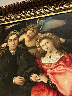 an ornate painting with three women and one man