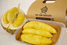 the durian is cut in half and ready to be eaten