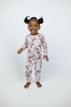 Introducing the "Love on Wheels" 2-Piece Set from our "Valentine's Day" collection, meticulously tailored for kids aged 2T to 7/8. Envelope your children in the snugness and flair of these enchanting pajamas, brimming with affection. Key Features: Ultra-Soft Fabric: Crafted from the finest bamboo fabric, our pajamas are unrivaled in softness, offering serene sleep and comfortable relaxation all day long. Easy Wear: Comprising a cozy top and matching bottoms, our set is designed for effortless dressing, streamlining nightly routines. Whimsical Design: Featuring an exclusive pattern of cozy coupes and hearts, "Love on Wheels" brings a playful and loving twist to bedtime attire, ideal for both boys and girls. Lasting Quality and Care: These pajamas are built to last through every childhood es Playful Matching Sets For Playtime, Playful Fitted Sets For Sleepovers, Family Matching Sets For Playtime, Cute Pink Holiday Sets, Pink Matching Playtime Sets, Playful Pink Sets For Holiday, Playful Pink Holiday Sets, Playful Christmas Playtime Clothing Sets, Playful Christmas Playtime Sets